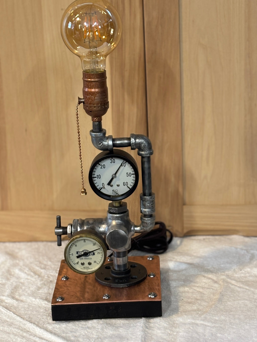 DIY retro scifi industrial Lamp (USB powered blue LEDs), made from an old  electron tube, lathed brass bits and a few painted aluminium parts. :  r/IndustrialDesign, image size:1024x1365