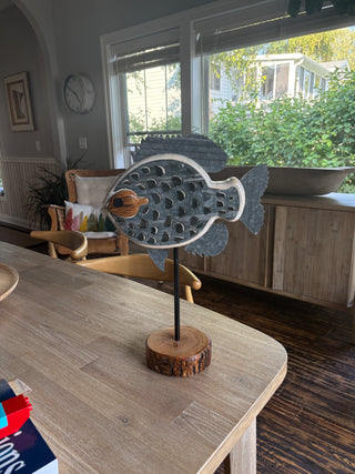 Metal scale standing fish