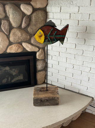 Fish on large wood stand