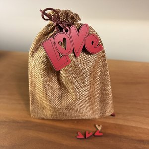 SMALL WOODEN PUZZLES IN BAGS