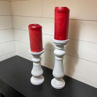 White-over-black rustic candle sticks