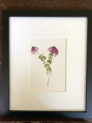 Flowers in black frame on handmade paper